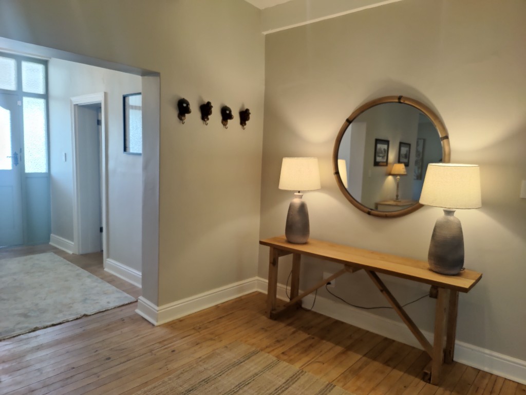 Welcoming entrance hallway with console table and mirror