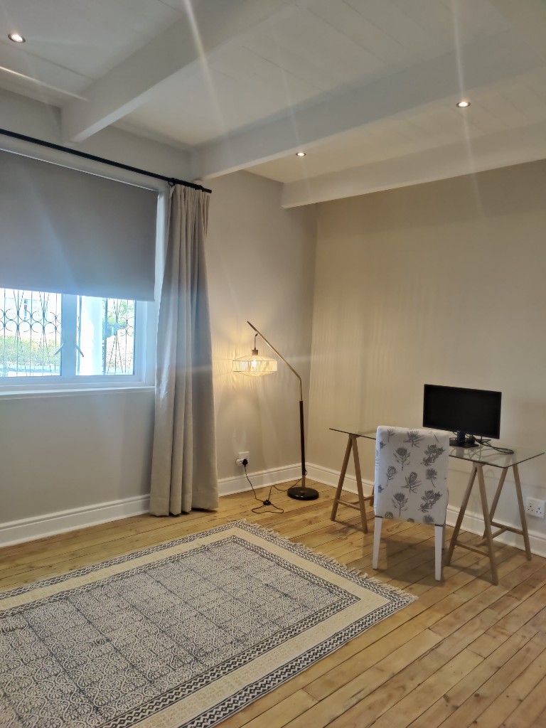 Study nook with desk and wooden floors